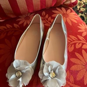 Brand new Small girl’s silver flat shoes. Size 13